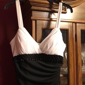 Black and white gown with beads and side zipper